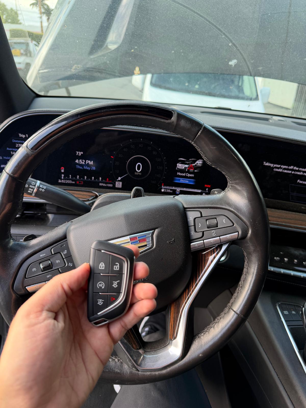 Cadillac key fob inside the vehicle