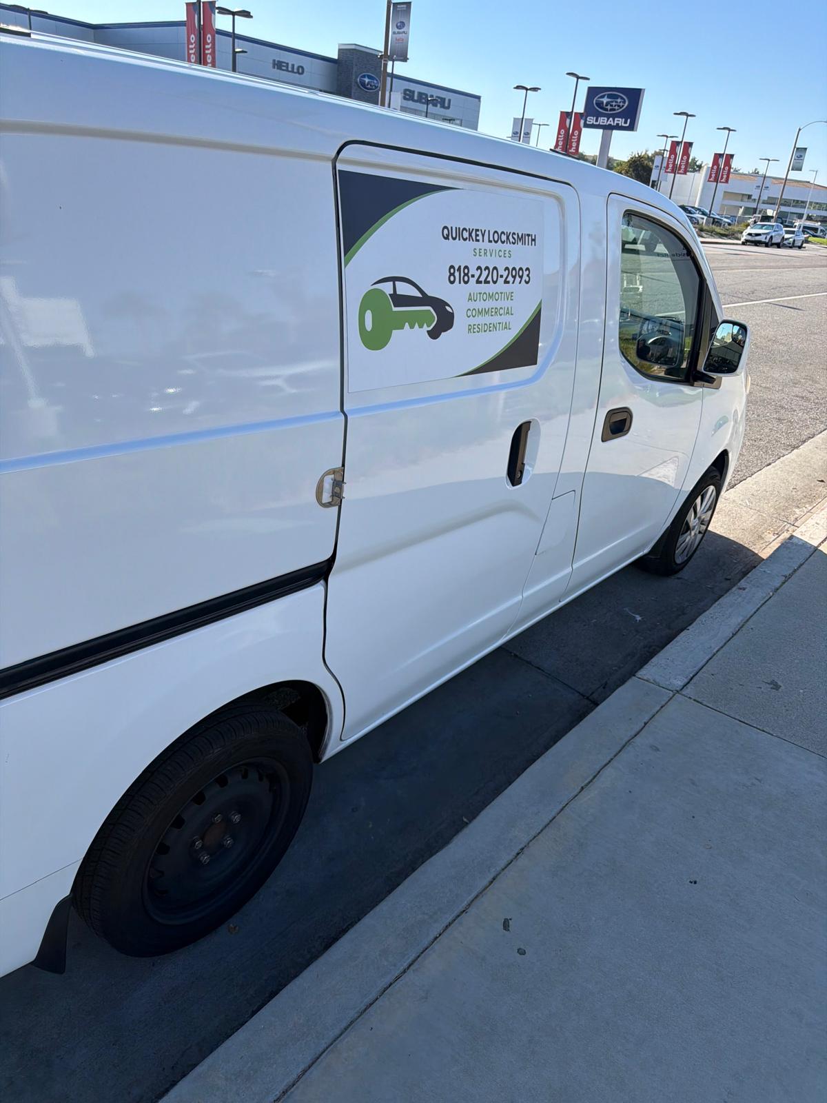 QuicKey's branded mobile locksmith service van